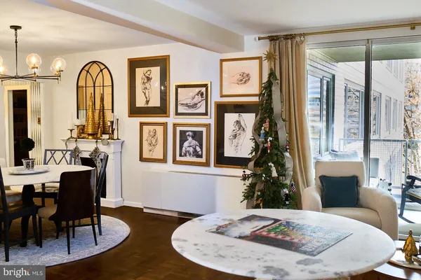 a view of a livingroom with furniture window and wooden floor