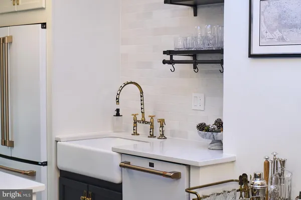 a room with a table and chairs