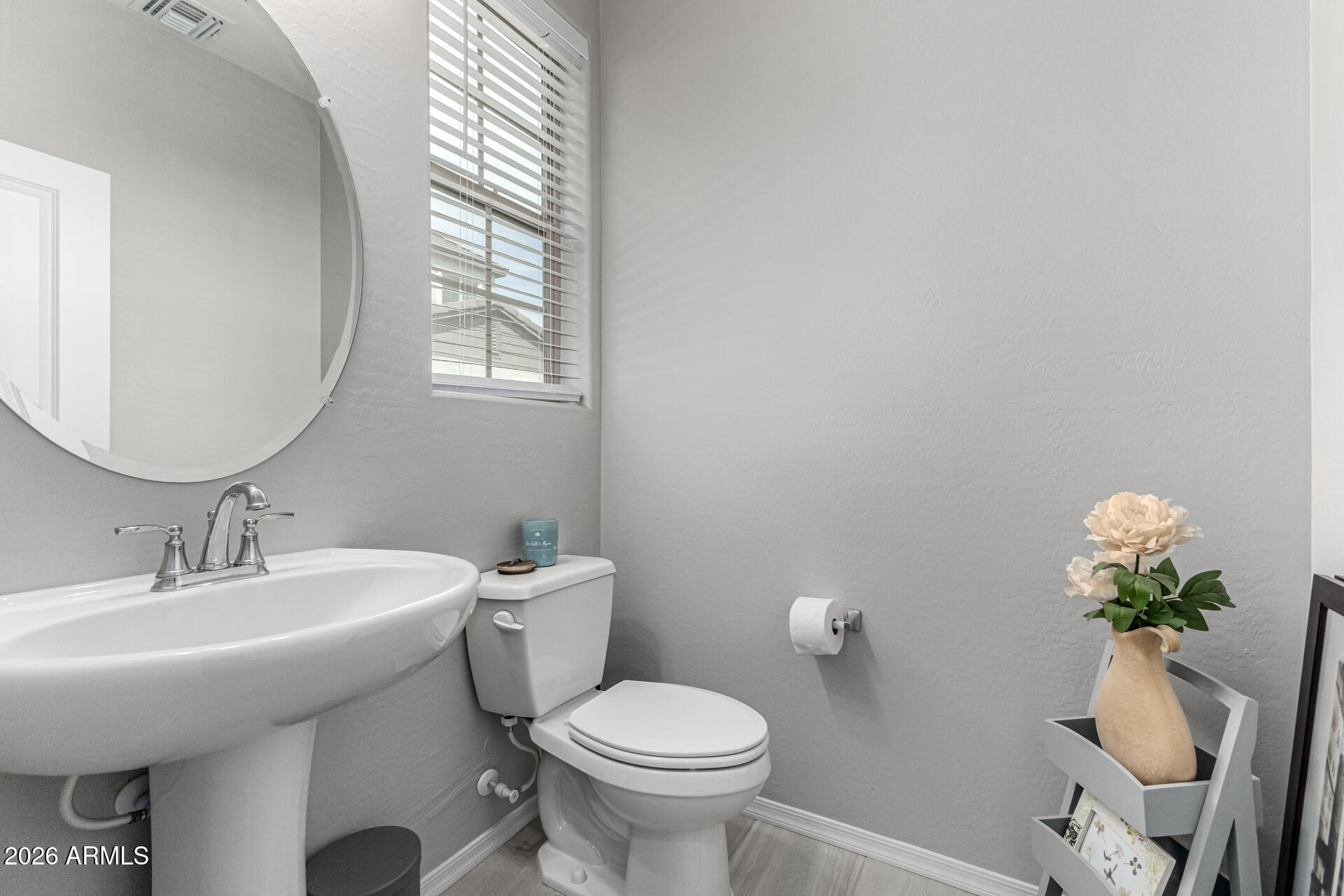 1747 East Chelsea Lane Gilbert, AZ 85295 - Photo 14 of 30 a bathroom with a sink mirror and toilet