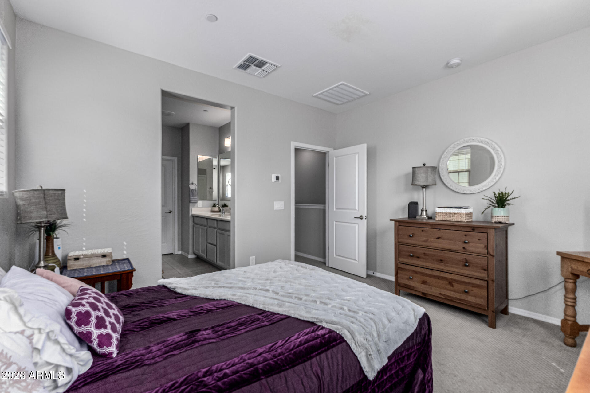 1747 East Chelsea Lane Gilbert, AZ 85295 - Photo 16 of 30 a bedroom with a bed and a dresser
