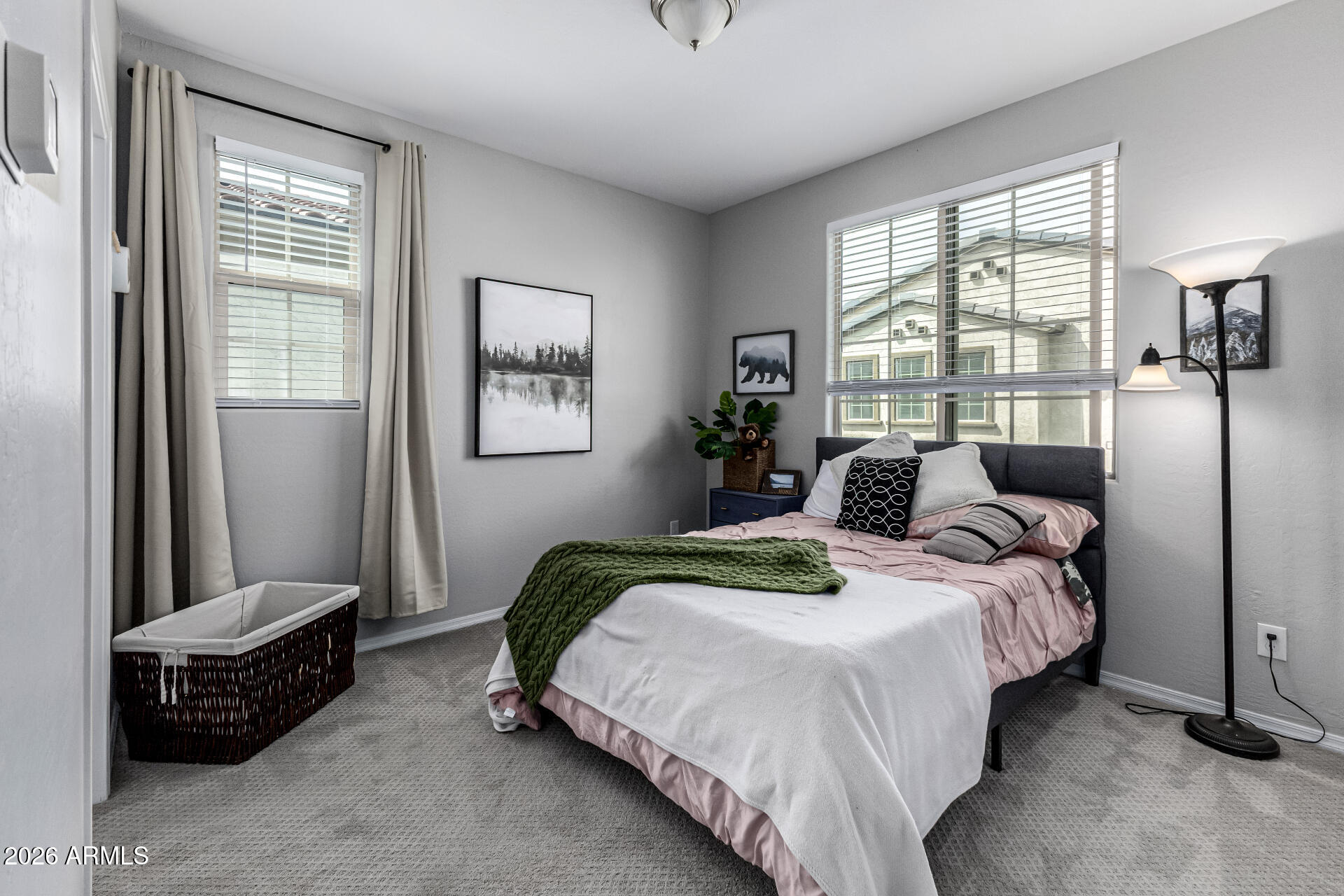 1747 East Chelsea Lane Gilbert, AZ 85295 - Photo 21 of 30 a bedroom with a bed a mirror and a window
