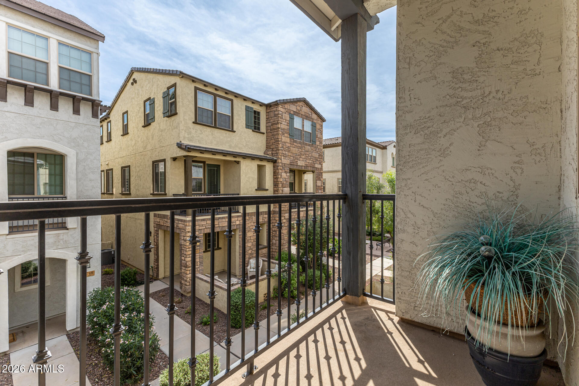 1747 East Chelsea Lane Gilbert, AZ 85295 - Photo 26 of 30 a view of a balcony with potted plants
