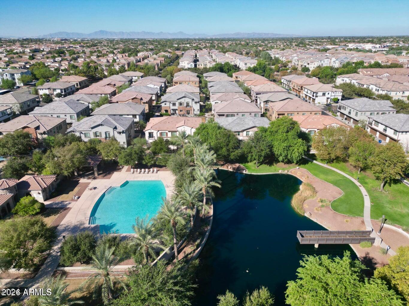 1747 East Chelsea Lane Gilbert, AZ 85295 - Photo 30 of 30 an aerial view of a house with a yard and lake view