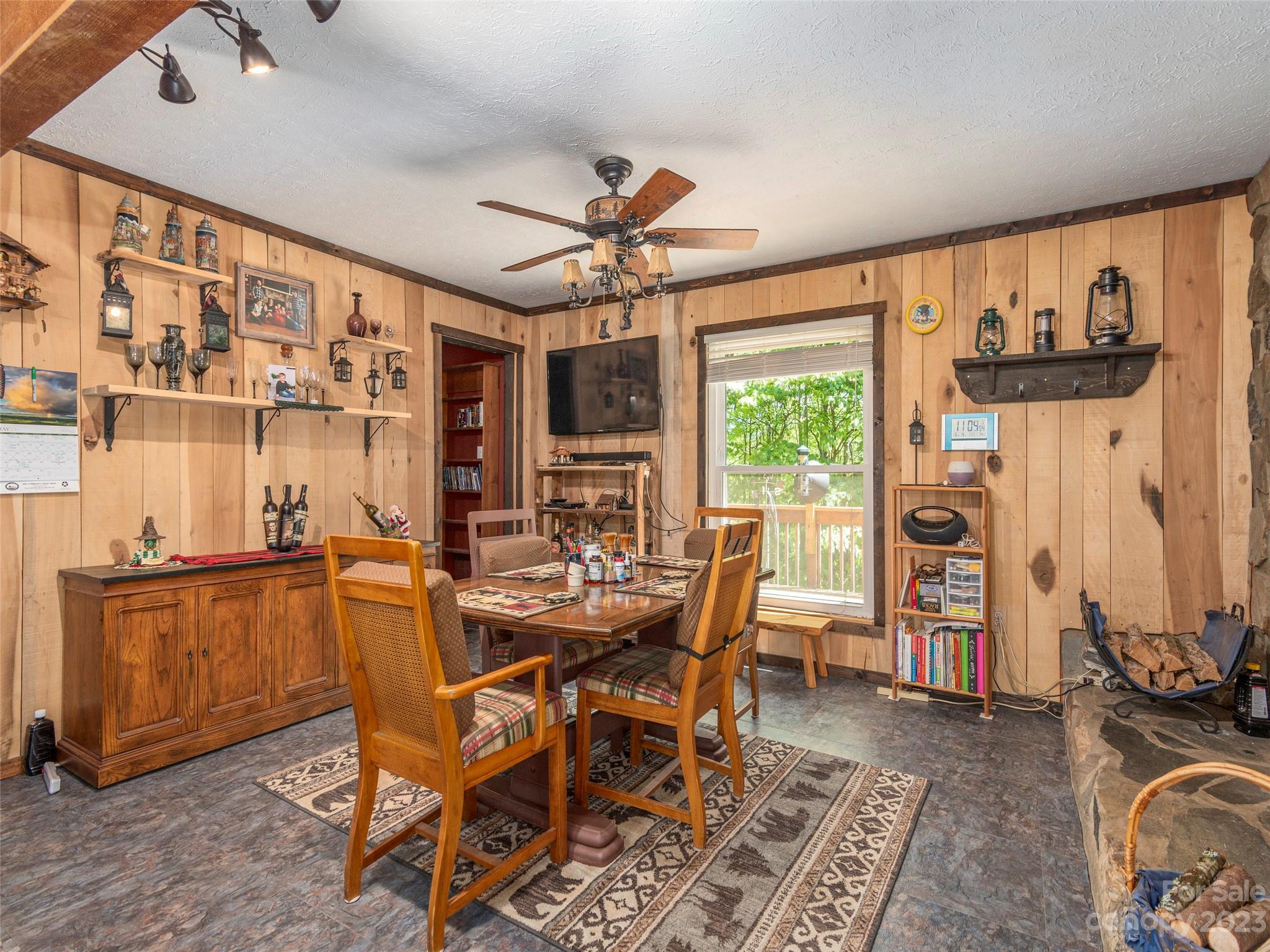 291 Dickinson Drive Clyde, NC 28721 - Photo 9 of 27 a view of a dining room with furniture window and outside view