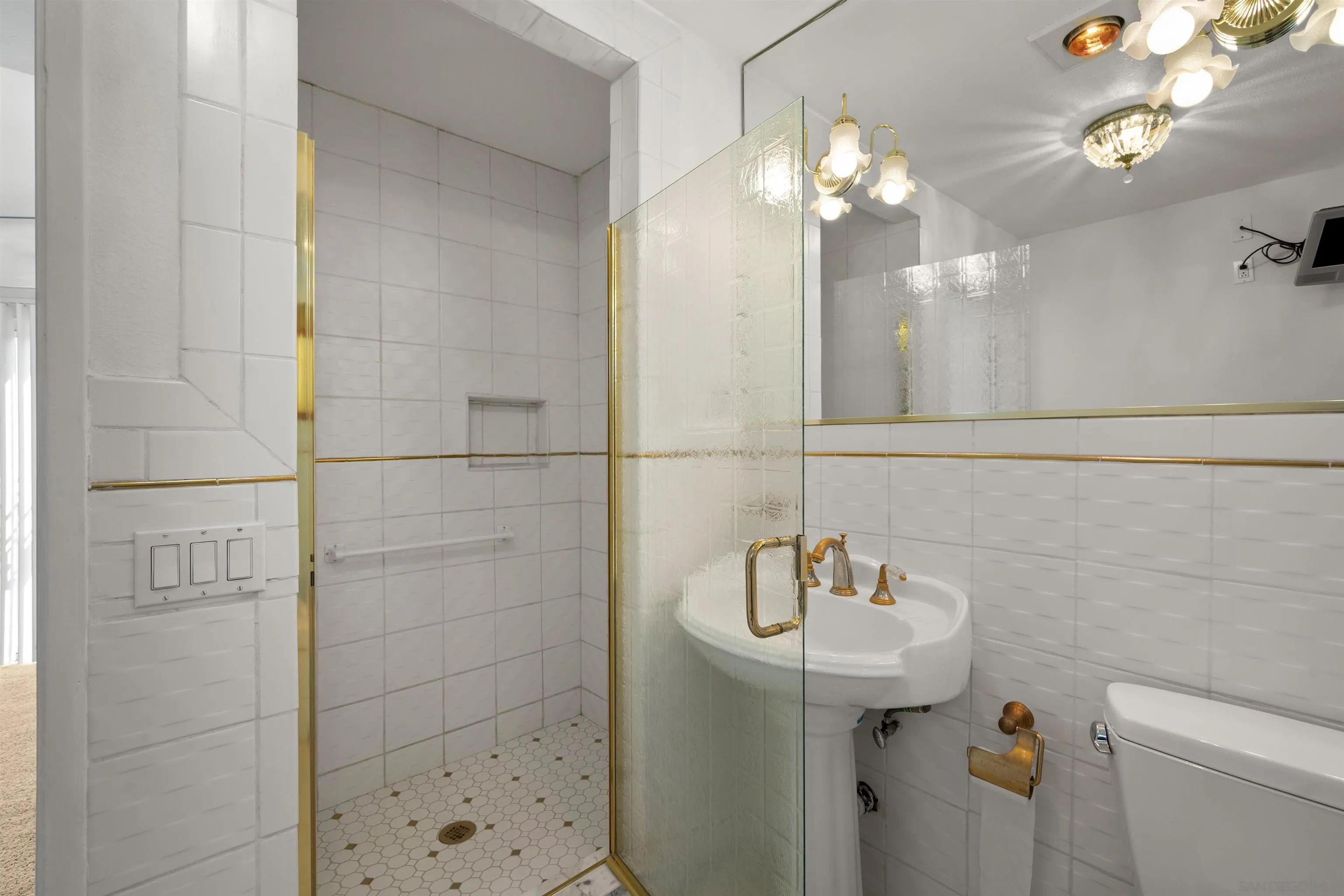 4815 Ebony Ridge Road San Diego, CA 92102 - Photo 26 of 45 a bathroom with a sink a toilet and shower