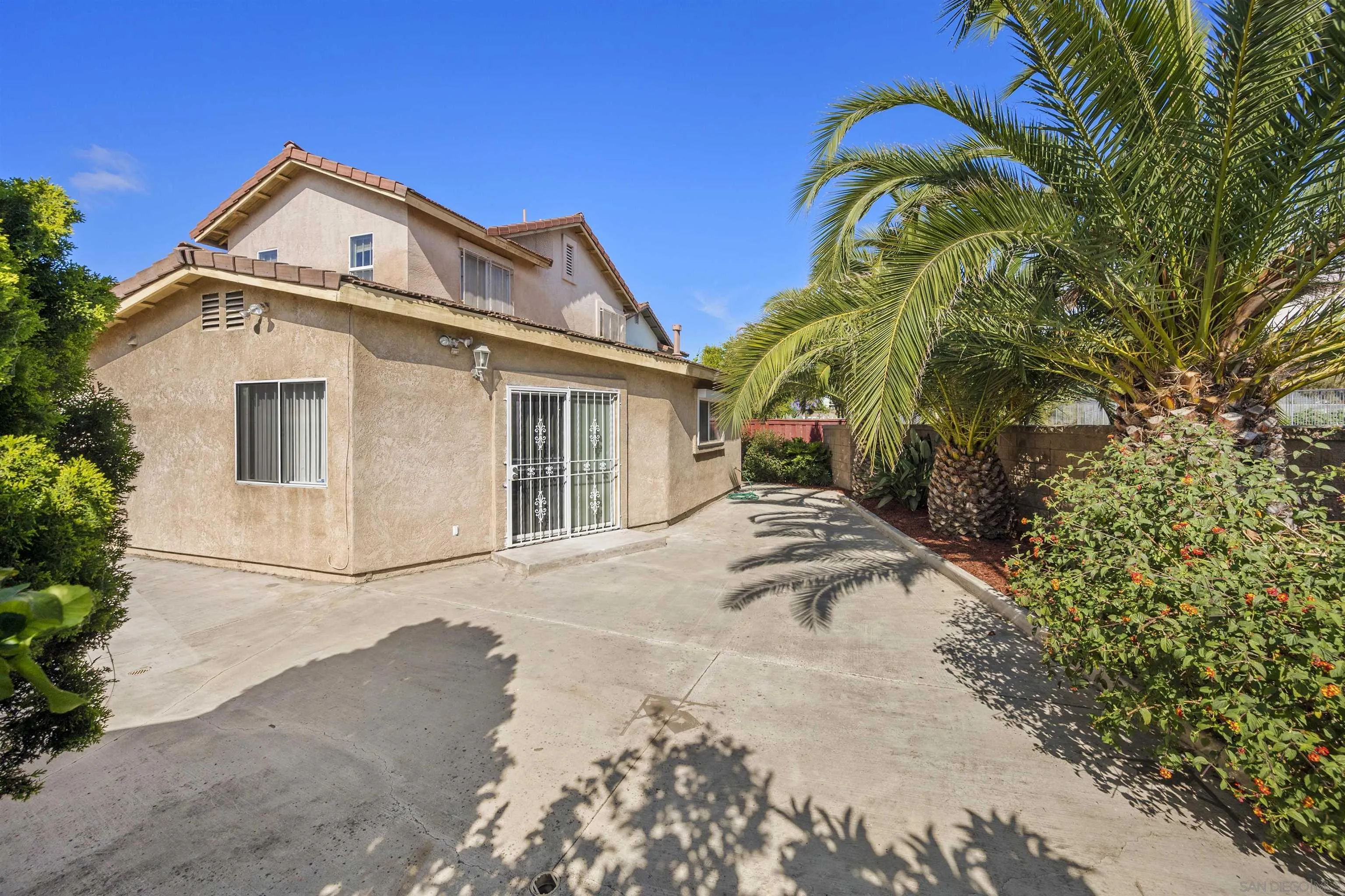 4815 Ebony Ridge Road San Diego, CA 92102 - Photo 37 of 45 a view of a house with a yard
