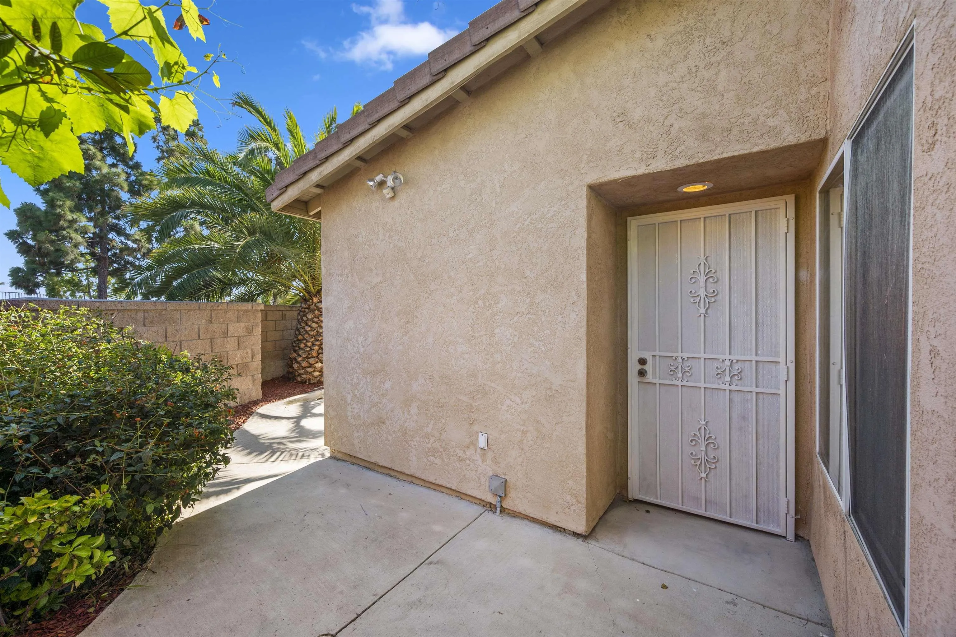 4815 Ebony Ridge Road San Diego, CA 92102 - Photo 4 of 45 a view of a house with a backyard