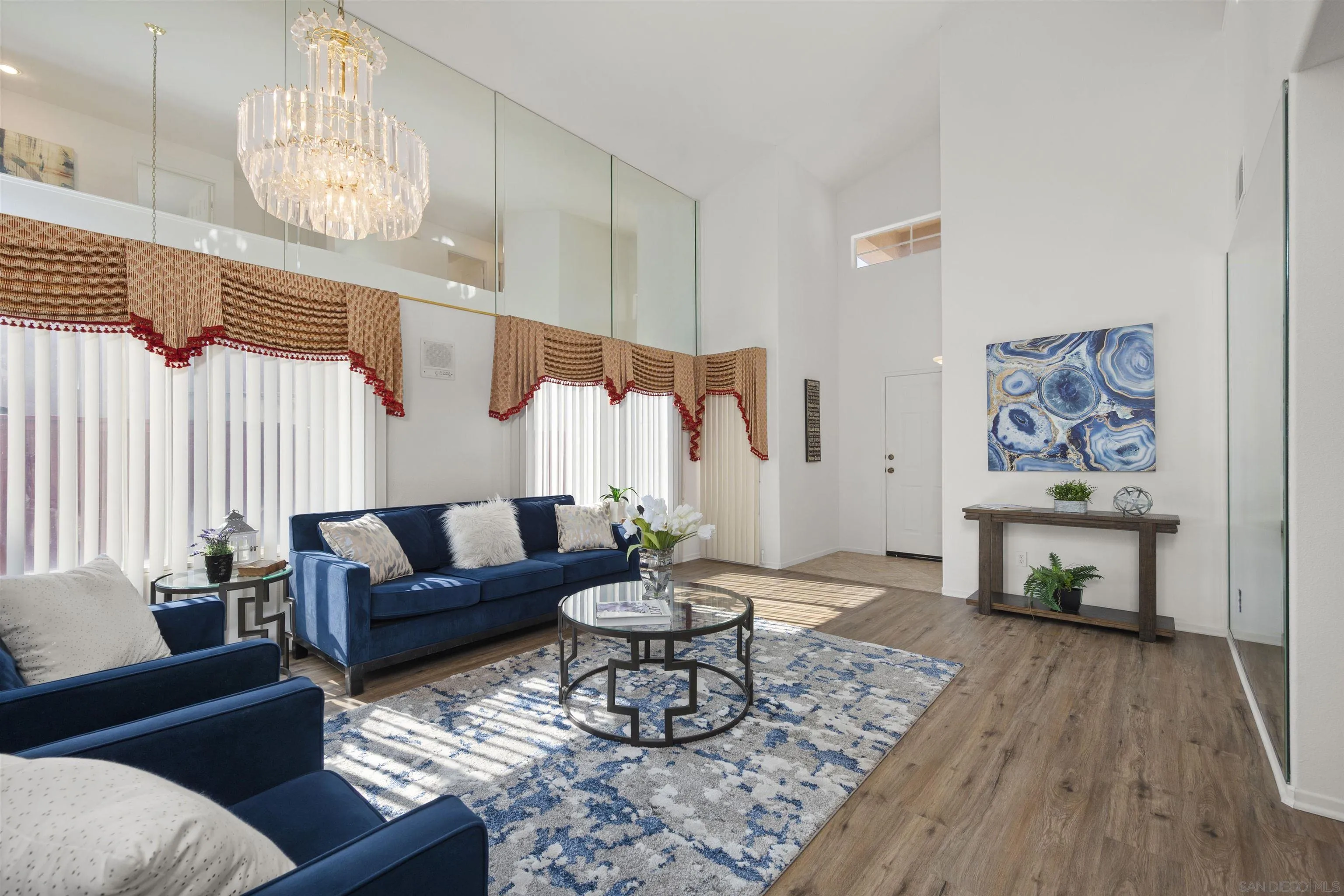 4815 Ebony Ridge Road San Diego, CA 92102 - Photo 5 of 45 a living room with furniture a rug and a large window