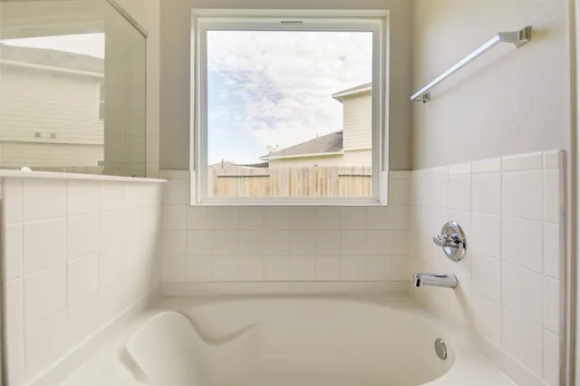 a bathroom with a bathtub