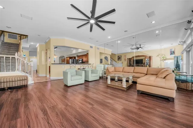 a spacious bathroom with a granite countertop sink mirror and