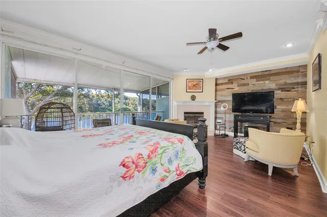 a dining room with furniture and wooden floor