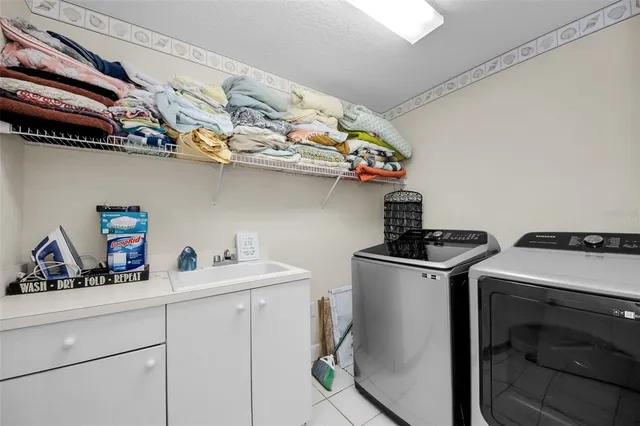 a view of a lake with houses in the back