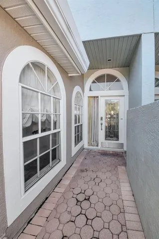a kitchen with stainless steel appliances granite countertop a stove microwave and sink