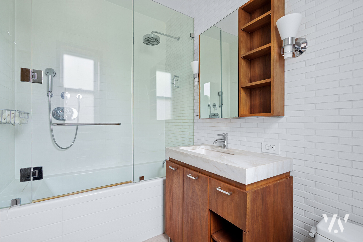 800 West End Avenue, Unit 12B Manhattan, NY 10025 - Photo 12 of 19 a bathroom with a sink and a mirror