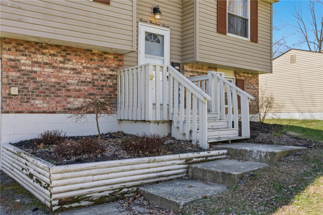 707 West Martindale Road Union, OH 45322 - Photo 27 of 28 This charming home features a welcoming entrance with a combination of brick and siding.