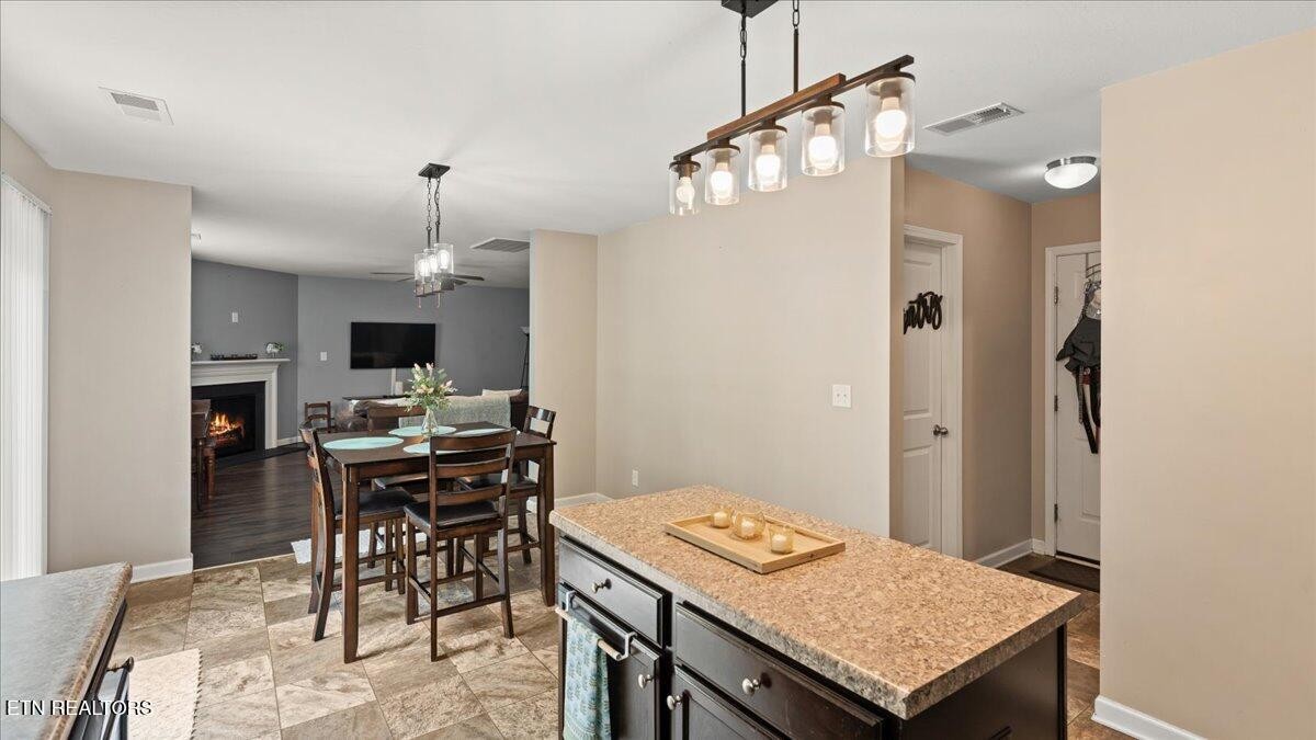 1816 River Poppy Road Mascot, TN 37806 - Photo 20 of 52 a kitchen with a table and chairs in it