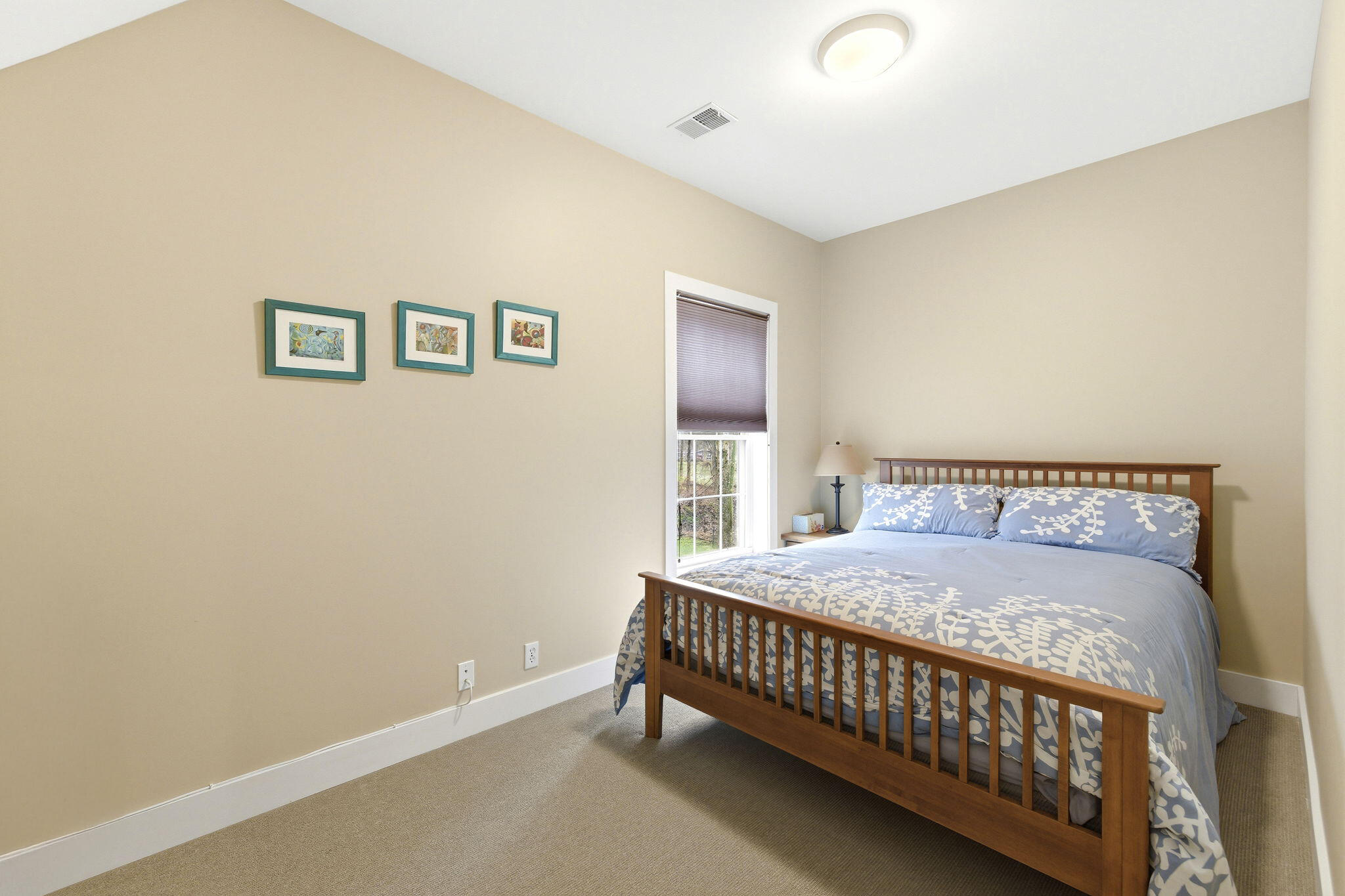 71 Timber Trail Michigan City, IN 46360 - Photo 18 of 27 a bedroom with a bed and a window