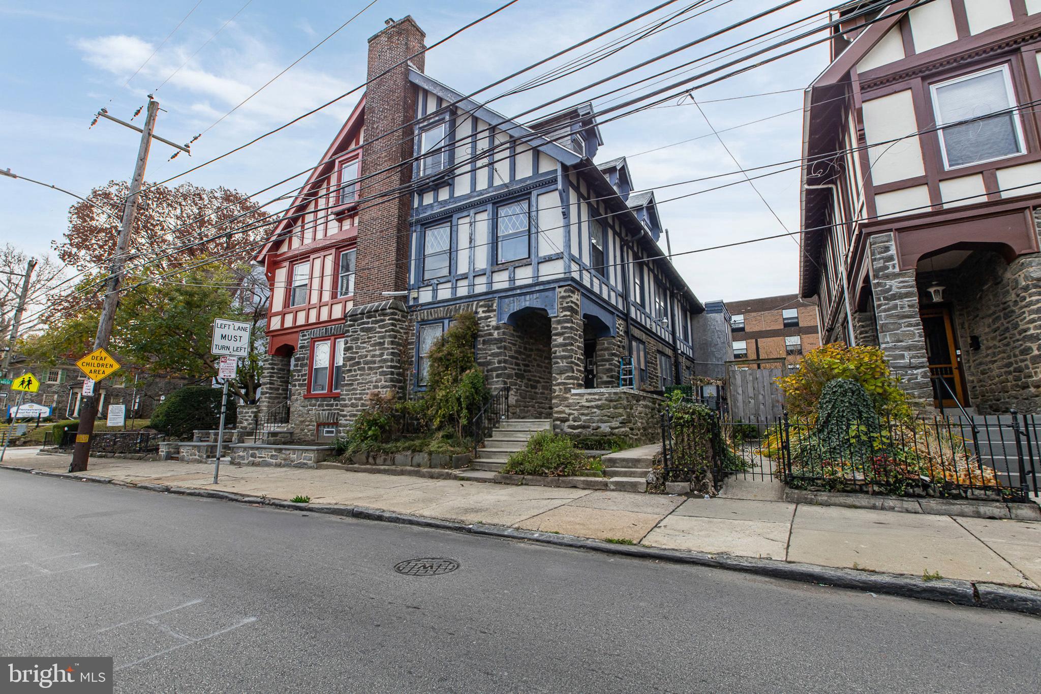 5506 Greene Street Philadelphia, PA 19144 - Photo 1 of 17 a view of a street that has a two windows on it