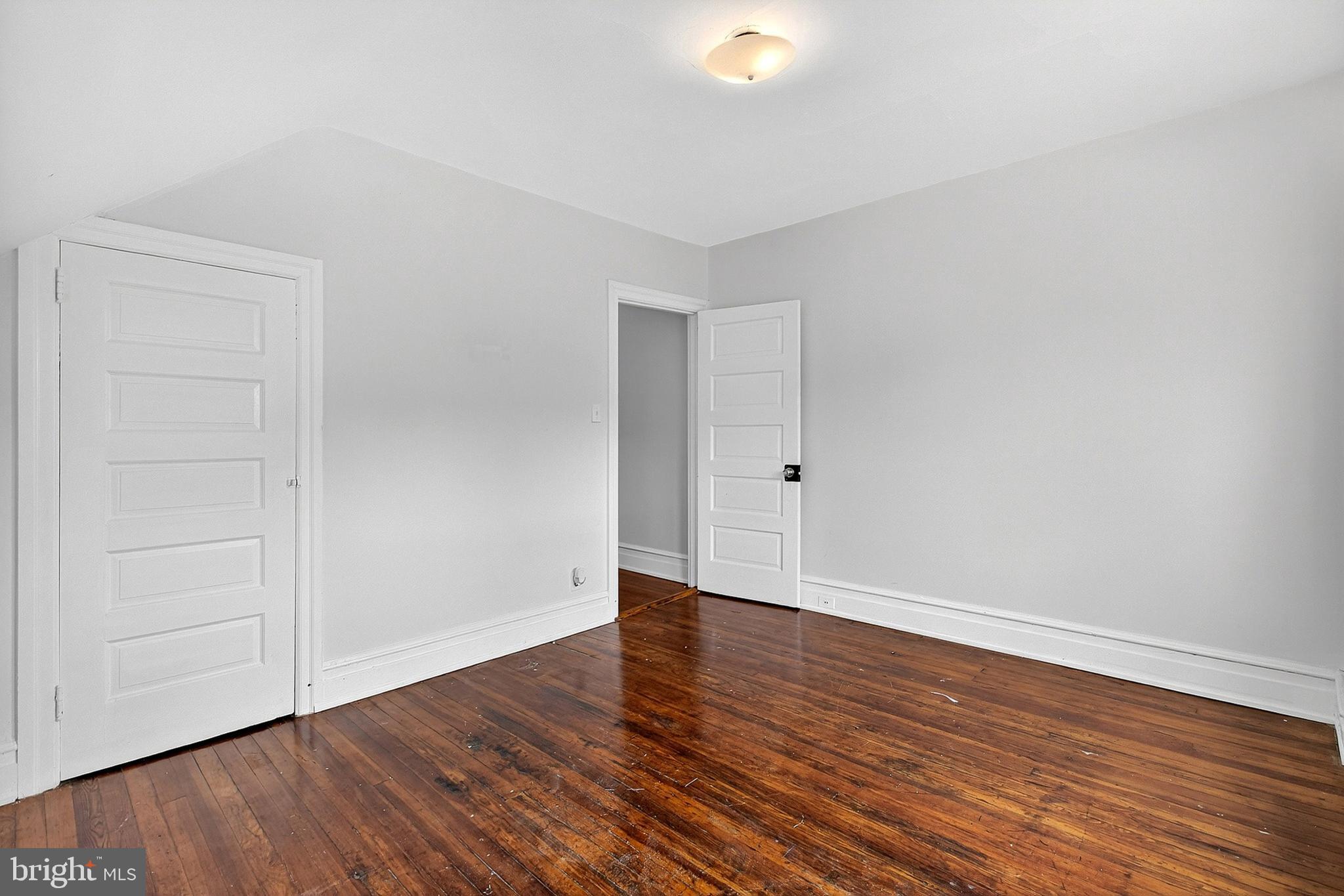 5506 Greene Street Philadelphia, PA 19144 - Photo 12 of 17 a view of an empty room with wooden floor