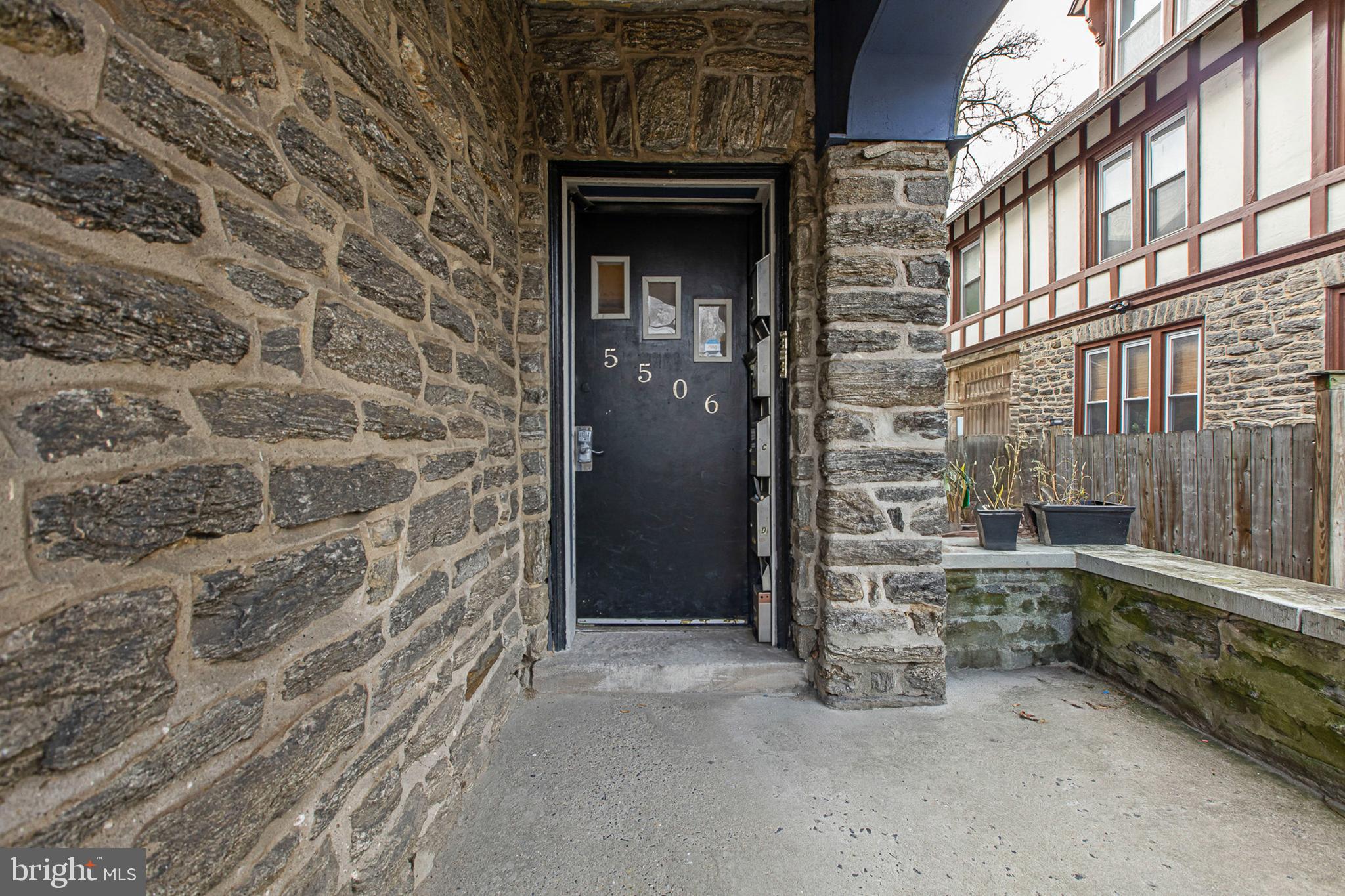 5506 Greene Street Philadelphia, PA 19144 - Photo 3 of 17 a view of a brick house with an empty space