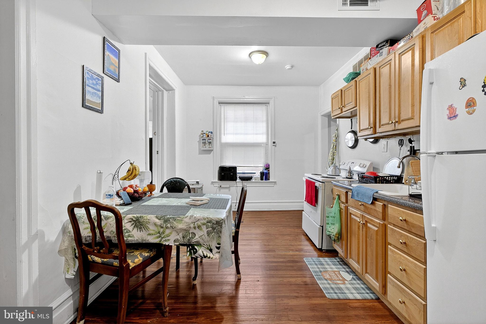 5506 Greene Street Philadelphia, PA 19144 - Photo 4 of 17 a view of a dining room with furniture