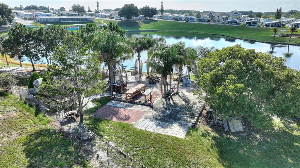 251 Patterson Road, Unit J19 Haines City, FL 33844 - Photo 24 of 30 a view of lake with green space