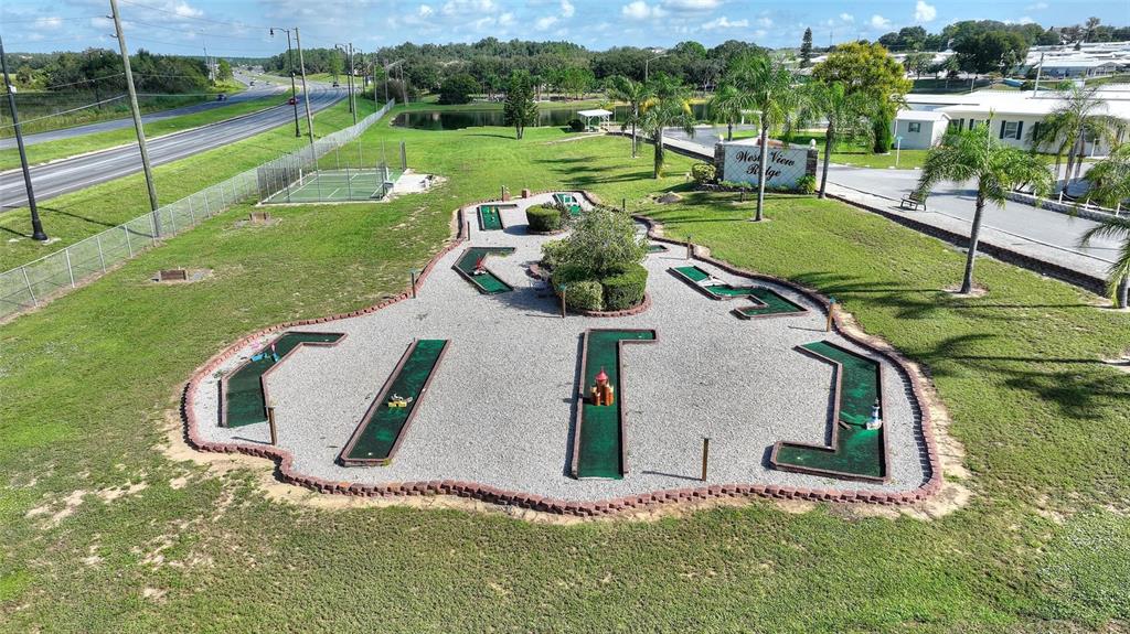 251 Patterson Road, Unit J19 Haines City, FL 33844 - Photo 26 of 30 an aerial view of a house with a yard