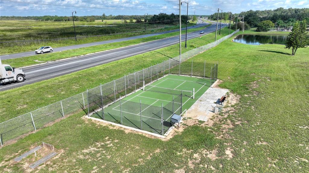 251 Patterson Road, Unit J19 Haines City, FL 33844 - Photo 27 of 30 a view of a park with large trees