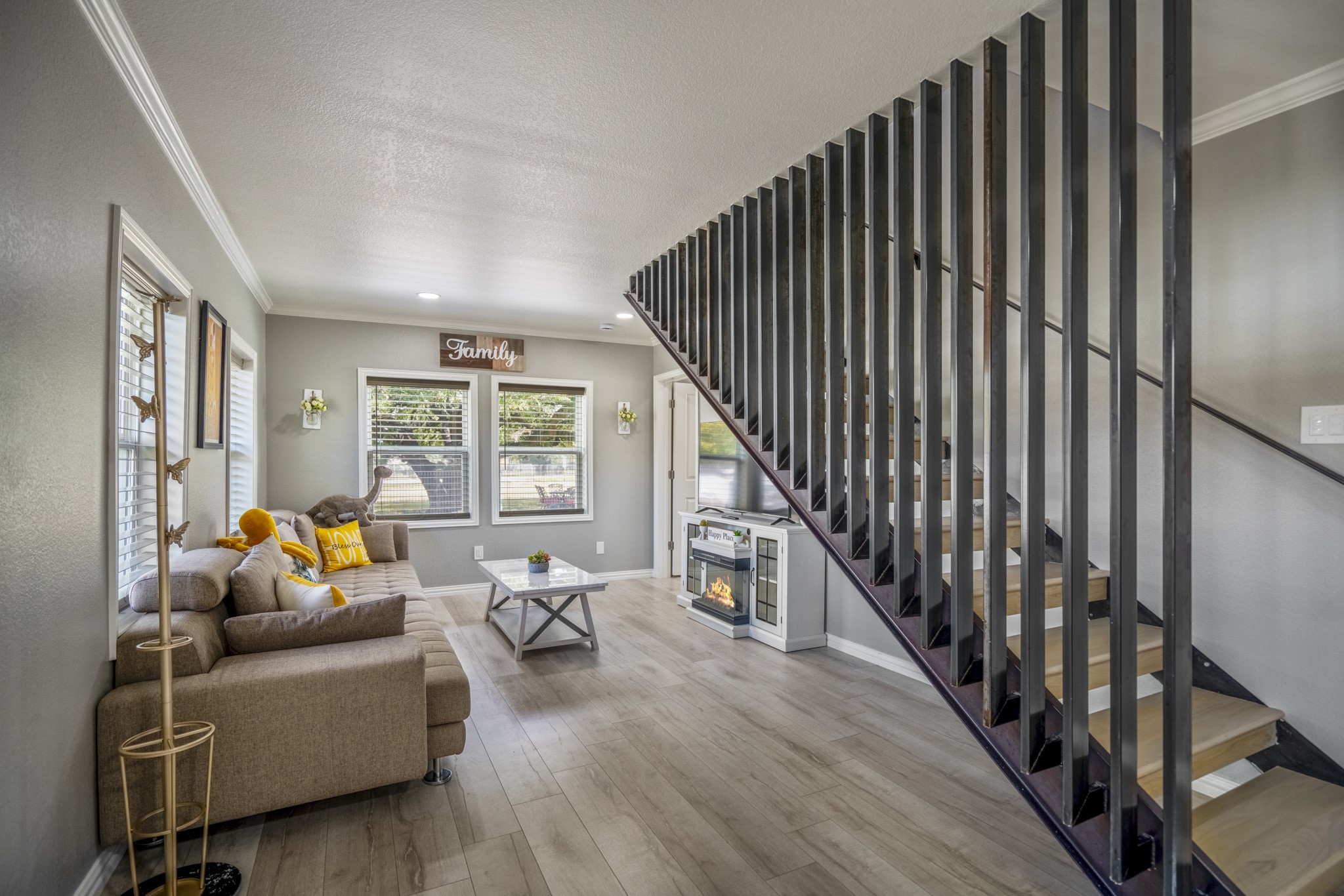 3207 Brownie Campbell Road Houston, TX 77086 - Photo 11 of 49 a living room with furniture and a large window