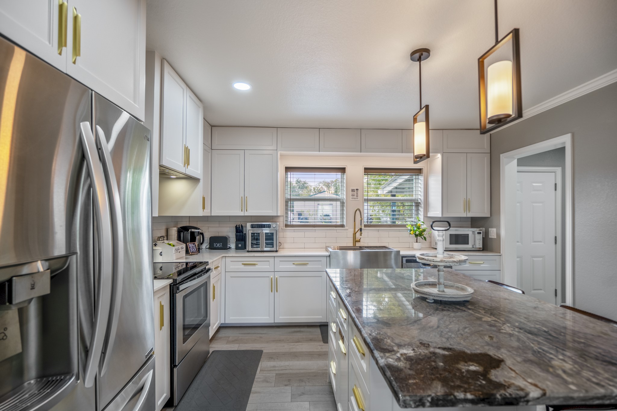 3207 Brownie Campbell Road Houston, TX 77086 - Photo 16 of 49 a kitchen with refrigerator and window