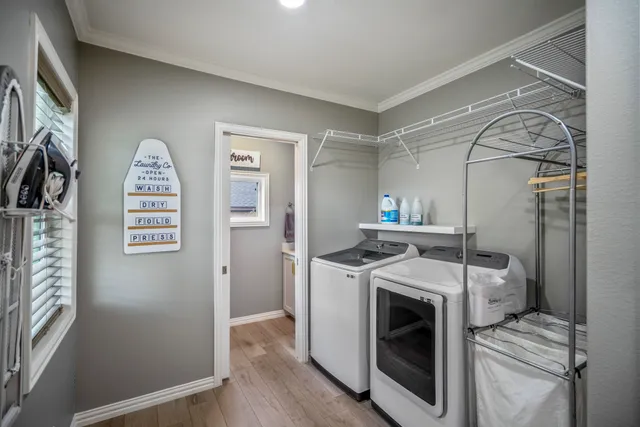 a utility room with dryer and washer