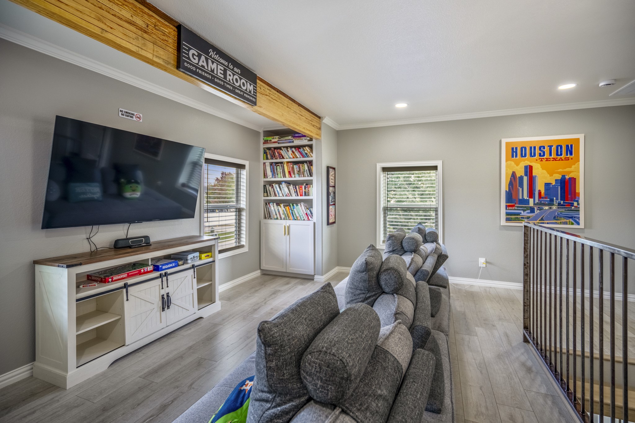 3207 Brownie Campbell Road Houston, TX 77086 - Photo 27 of 49 a living room with furniture and a flat screen tv
