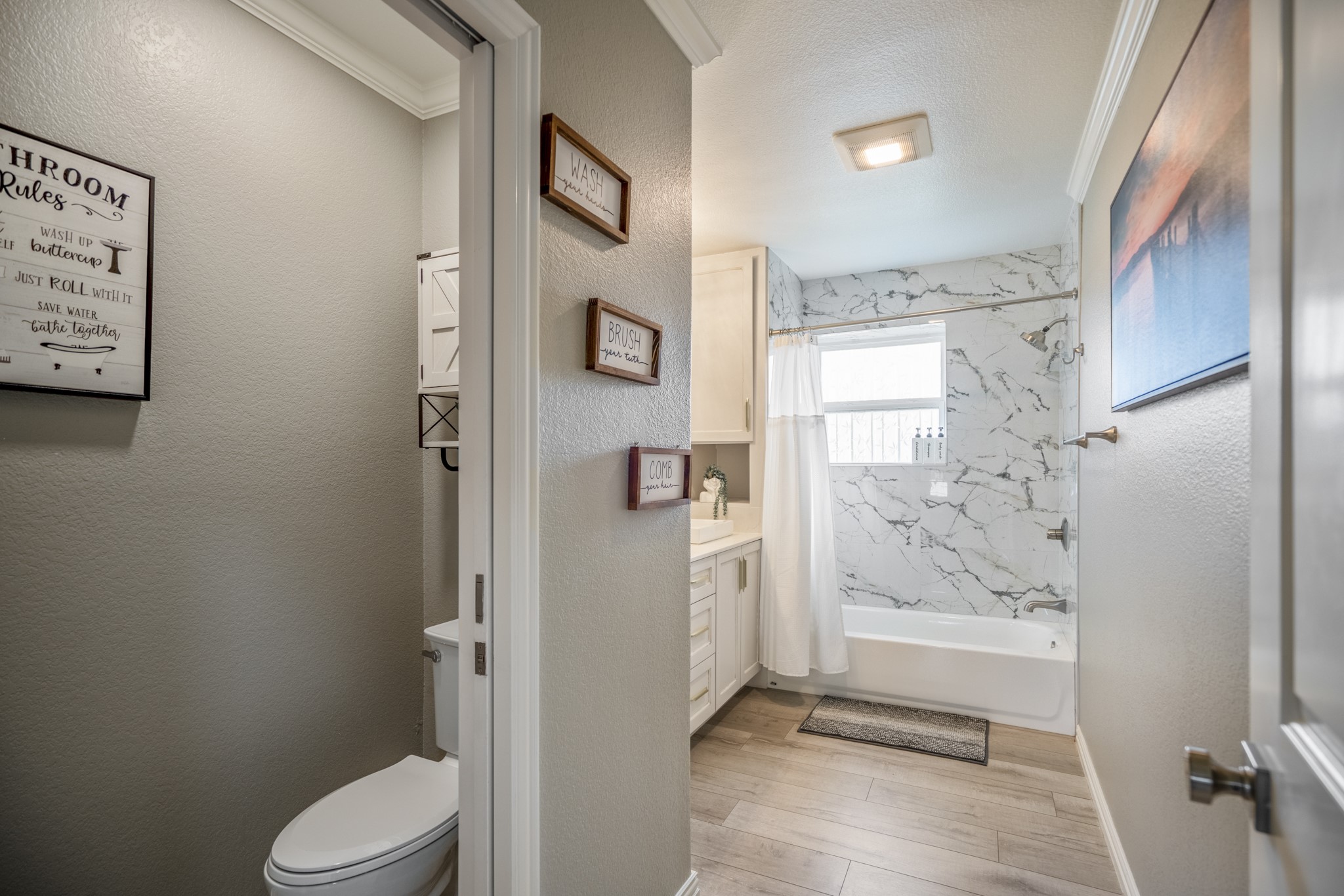 3207 Brownie Campbell Road Houston, TX 77086 - Photo 31 of 49 a bathroom with a shower and toilet