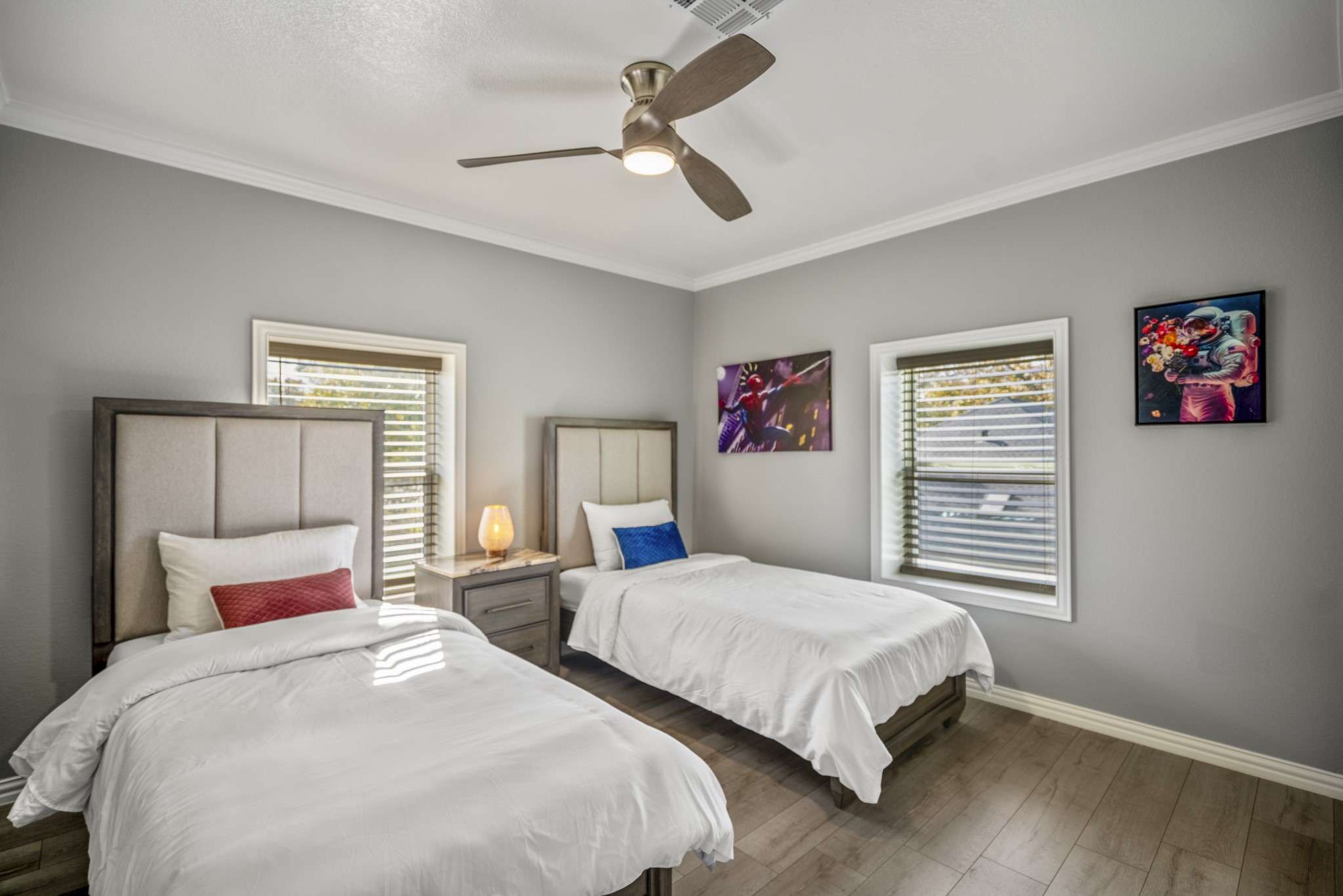 3207 Brownie Campbell Road Houston, TX 77086 - Photo 32 of 49 a bedroom with two beds and a chandelier