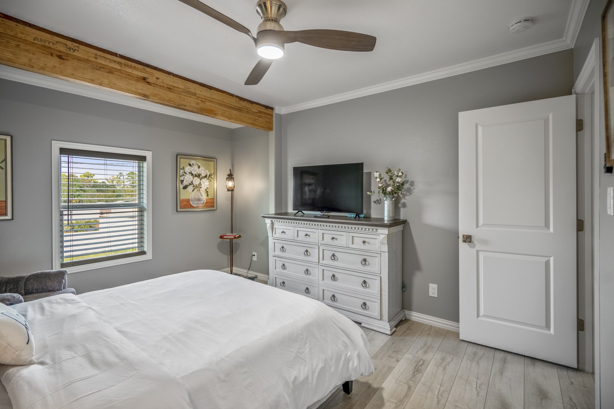 3207 Brownie Campbell Road Houston, TX 77086 - Photo 35 of 49 a bedroom with a bed and a flat screen tv