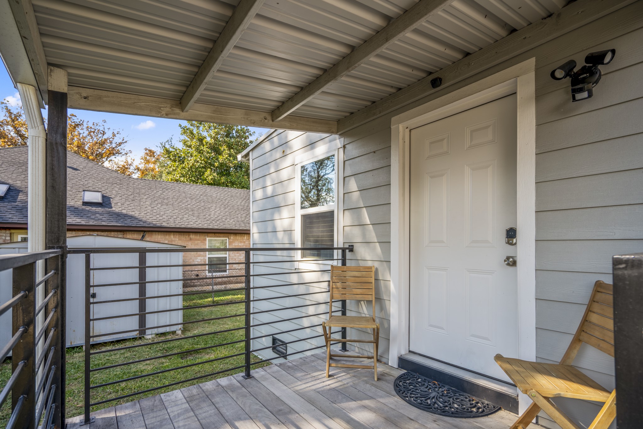 3207 Brownie Campbell Road Houston, TX 77086 - Photo 36 of 49 a view of a porch with wooden floor