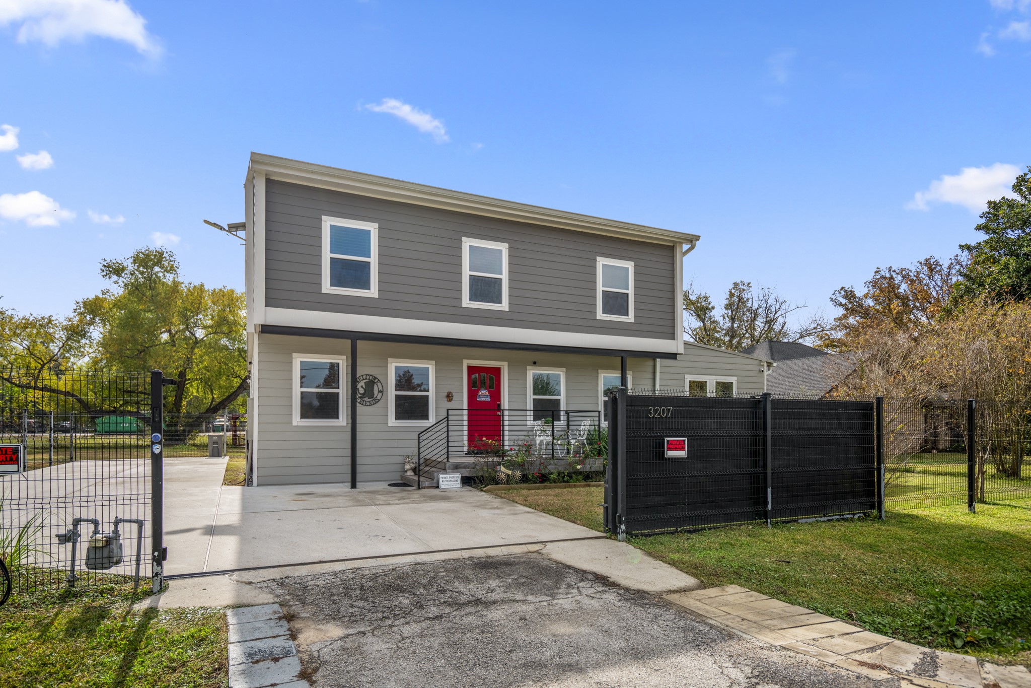 3207 Brownie Campbell Road Houston, TX 77086 - Photo 49 of 49 a view of a house with a backyard and a tree