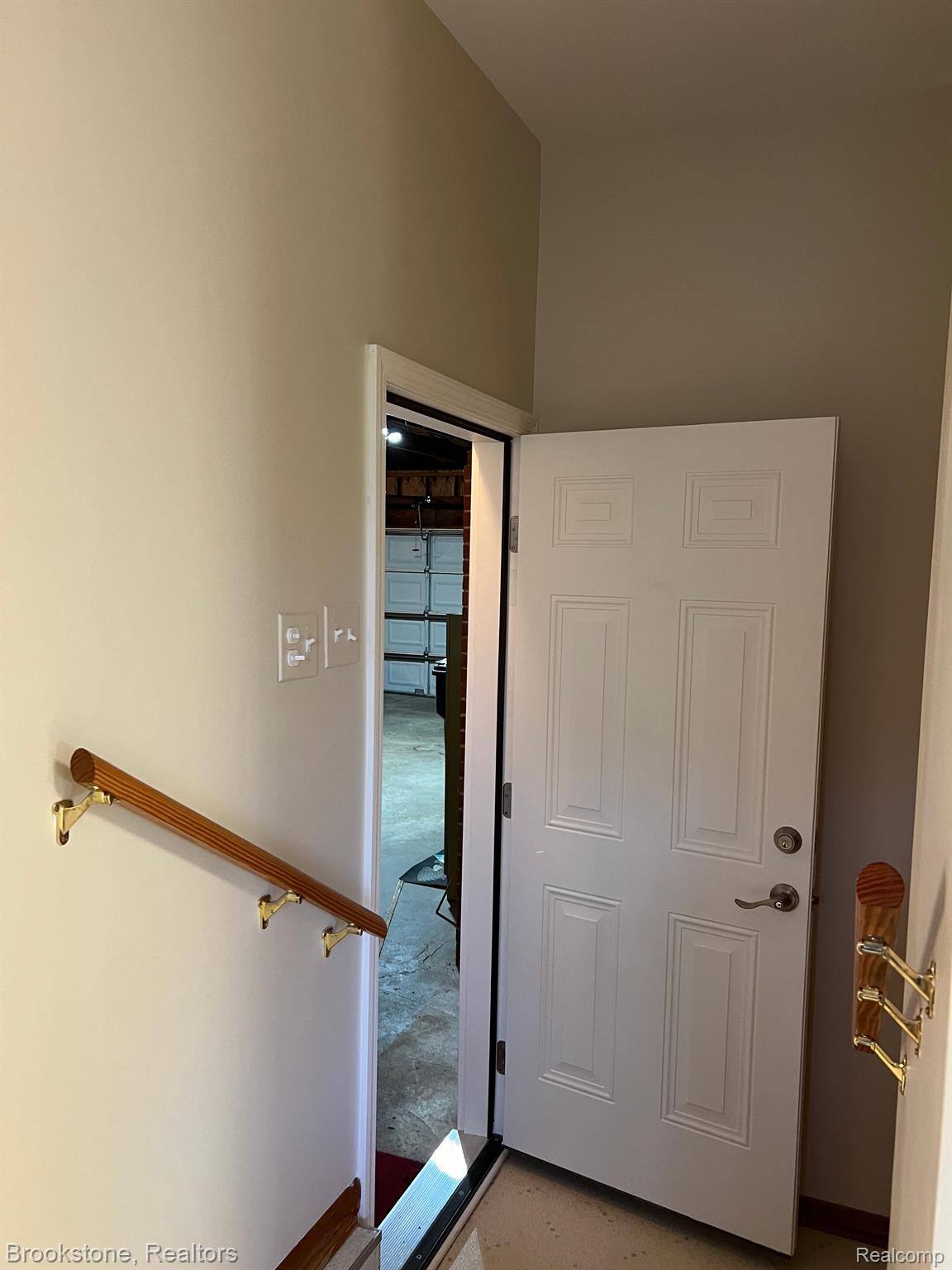 2205 Cole Road Lake Orion, MI 48362 - Photo 52 of 55 DR TO GARGE IS LOCATED ACCROSS FROM BASEMENT DR