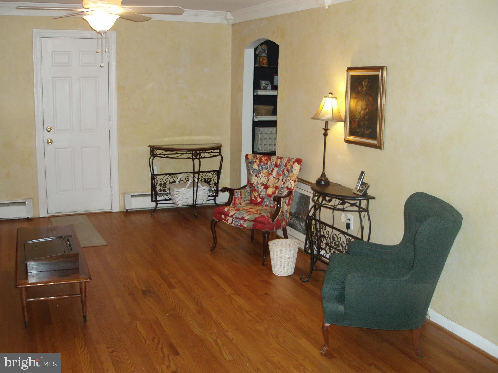 200 Cox Road Huntingtown, MD 20639 - Photo 5 of 27 a view of a living room and dining room