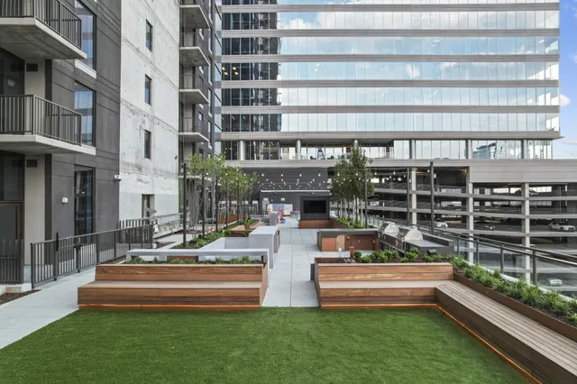 a front view of building with outdoor seating