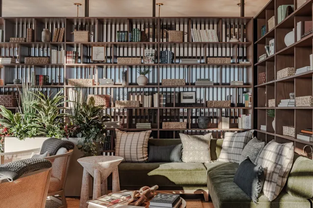 a terrace with outdoor seating and city view