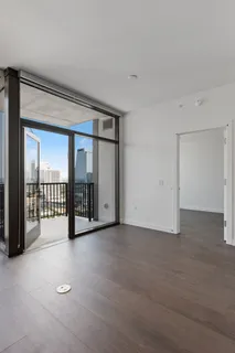 a view of an empty room with a window