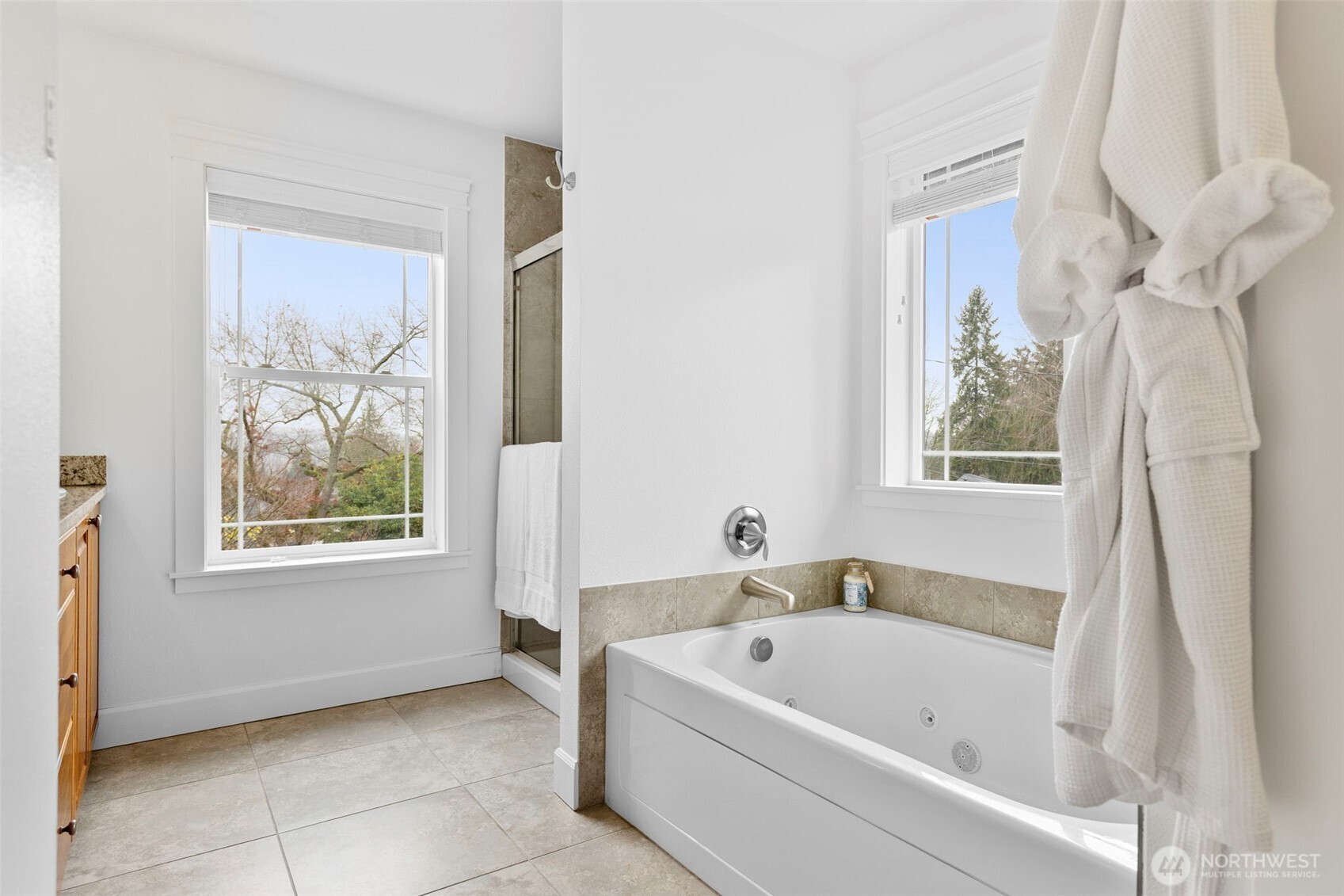 7650 Northeast 204th Place Kenmore, WA 98028 - Photo 23 of 39 a white bath tub sitting next to a window