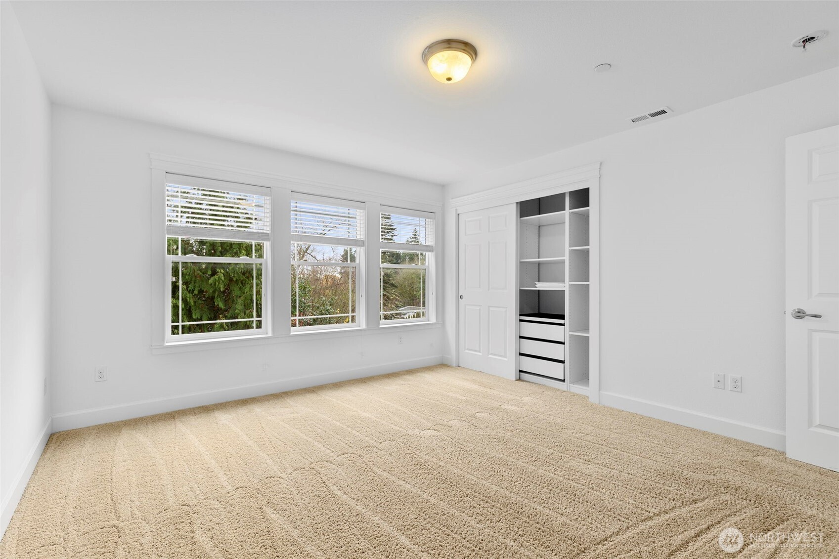 7650 Northeast 204th Place Kenmore, WA 98028 - Photo 27 of 39 a view of a room with a window and a kitchen