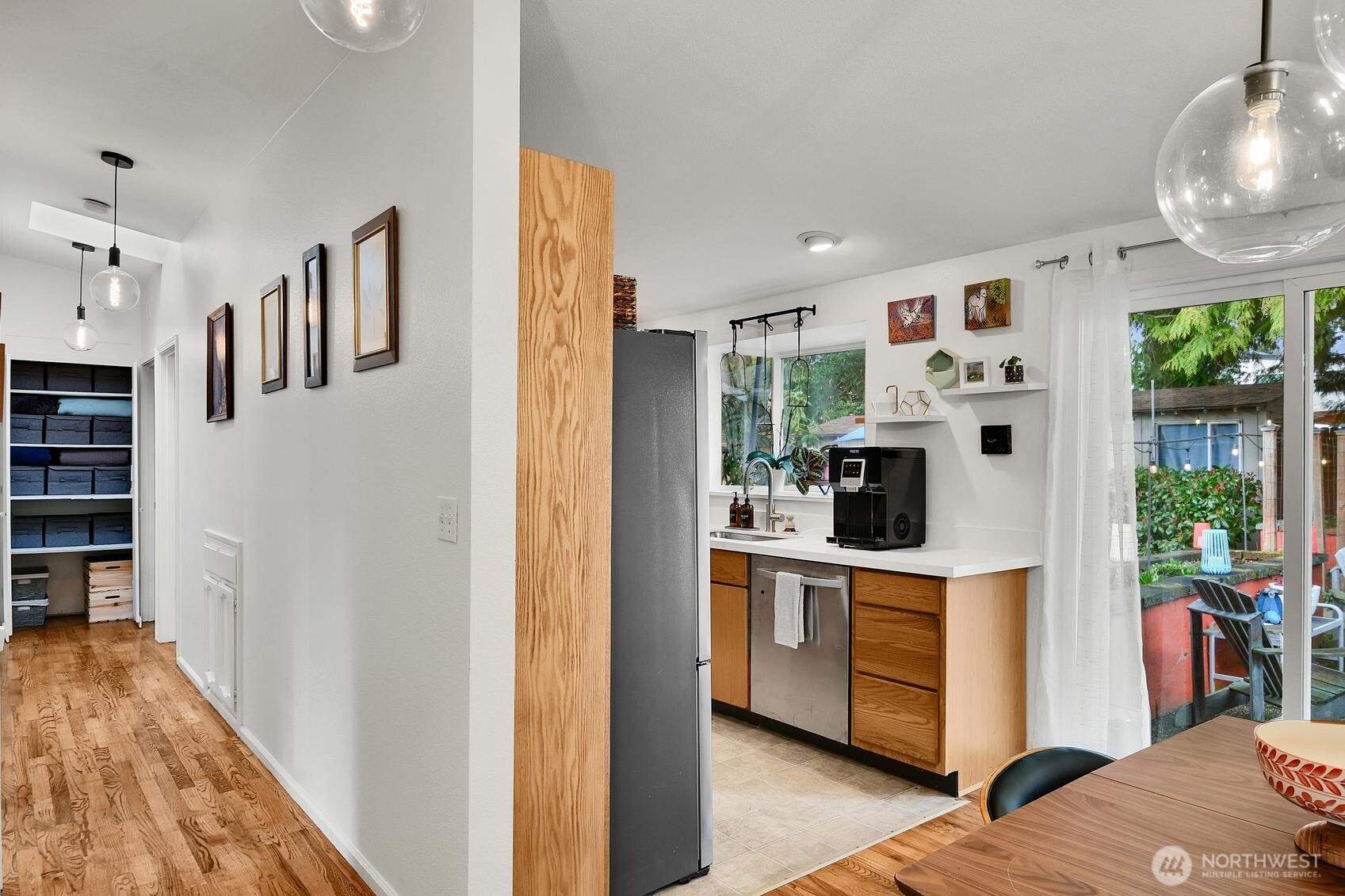8415 238th Street Southwest Edmonds, WA 98026 - Photo 8 of 21 a kitchen with stainless steel appliances a stove and a refrigerator