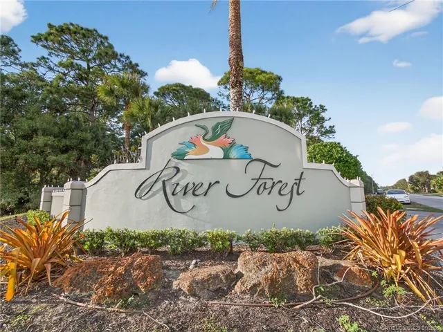 a view of grassy field with trees