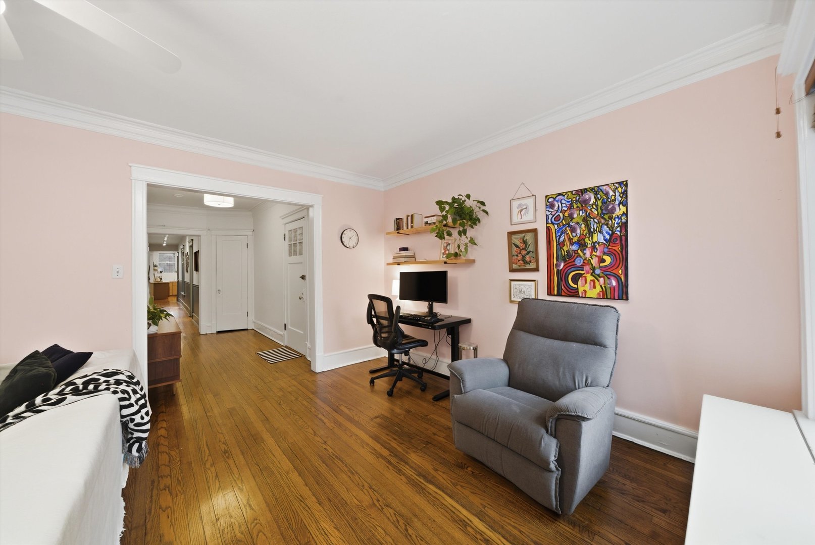 939 West Ainslie Street, Unit 2E Chicago, IL 60640 - Photo 14 of 47 a living room with furniture and a wooden floor