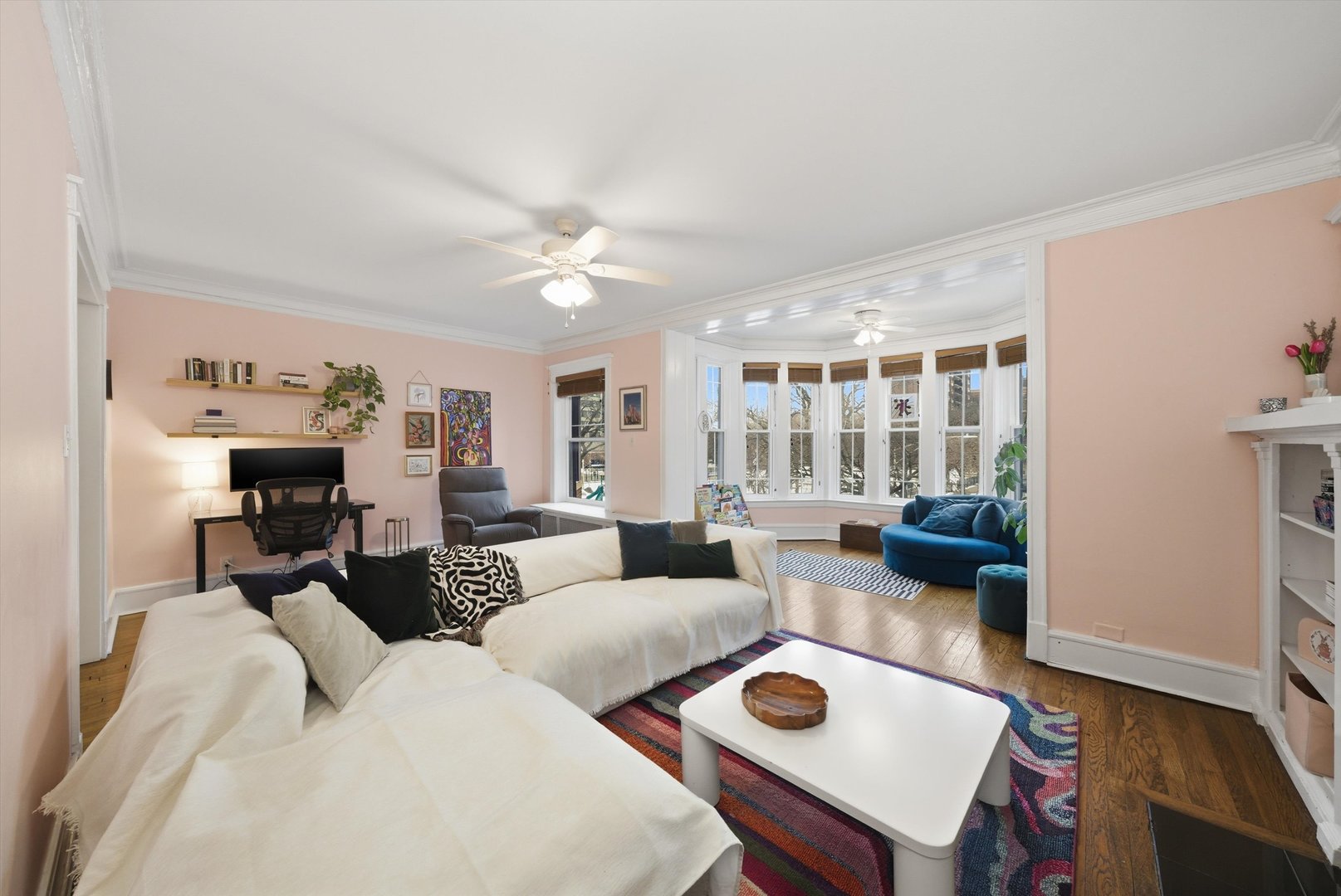 939 West Ainslie Street, Unit 2E Chicago, IL 60640 - Photo 5 of 47 a living room with furniture and wooden floor