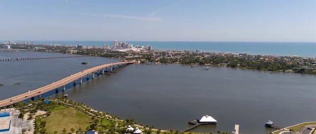 a view of a city and lake