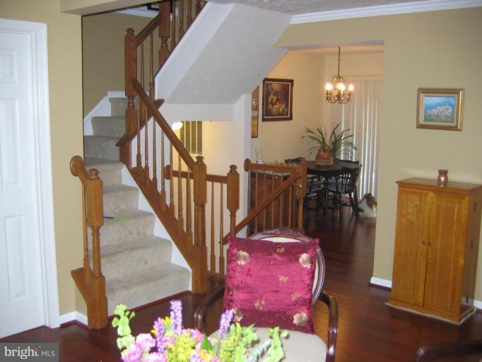 8624 Fire Rock Road Laurel, MD 20724 - Photo 15 of 30 Living Room to Dining Area, Staircase